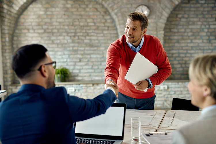 Happy Male Candidate Shaking Hands With Members Human Resource Team Job Interview Office