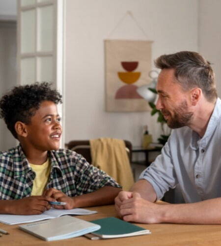 Student looks up to teacher