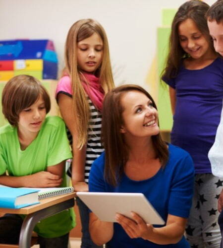 Teaching Assistant with her students