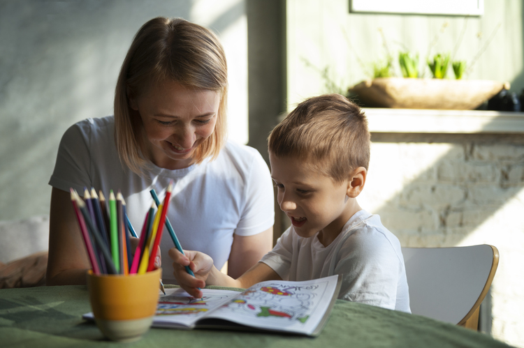 Woman educating an autistic student